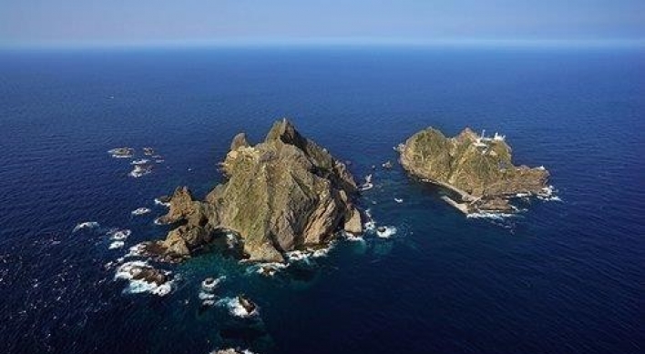 Ship carrying 9 capsizes in waters northeast of Dokdo