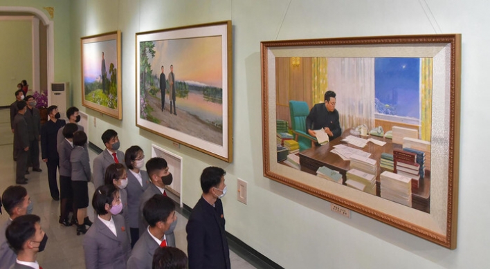 N. Korea urges 'absolute trust' in its leader, marking his father's death anniversary