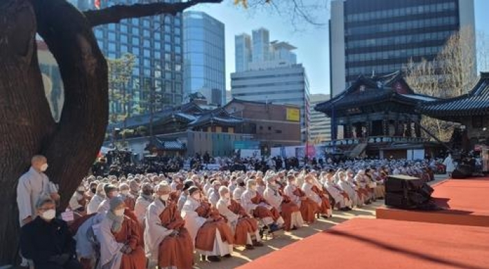 Thousands of Buddhist monks hold rally to demand apology from president for 'anti-Buddhist bias'