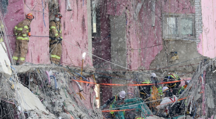 Rescuers retrieve body of missing worker from collapsed construction site in Gwangju