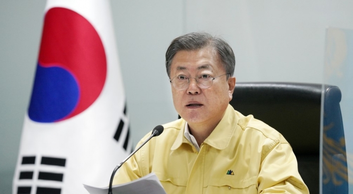 Moon says current surge ‘last hurdle,’ warns against panic