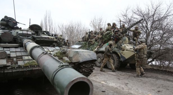 Russian invasion convoy masses near Ukraine capital