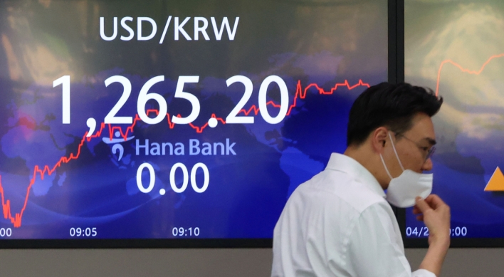 Seoul shares open slightly higher amid Fed rate hike woes