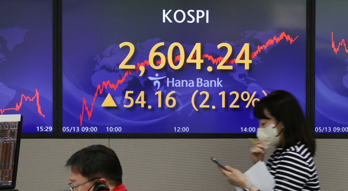 Seoul shares open higher amid woes over sharp rate hikes
