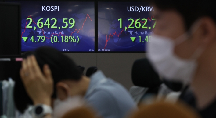 Seoul shares open lower ahead of Fed minutes release