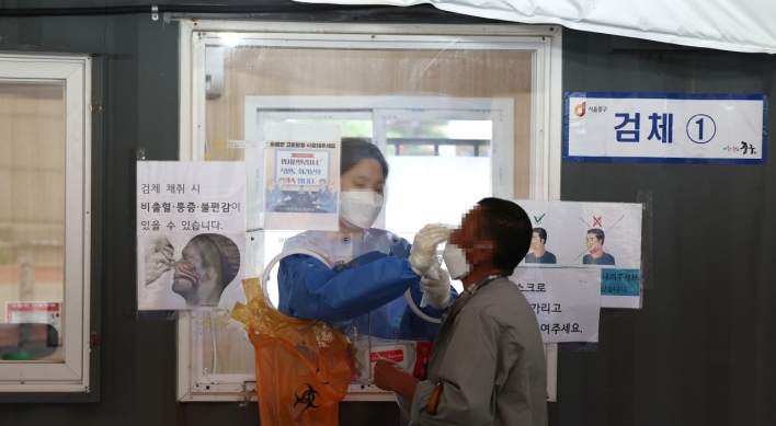 S. Korea's new COVID-19 cases slip back below 10,000