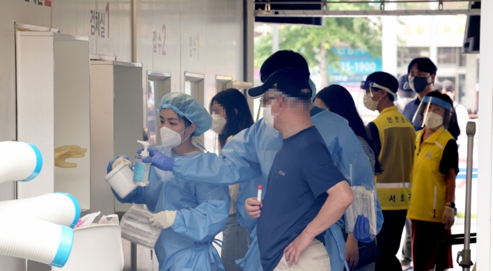 S. Korea's new virus cases under 70,000 for 3rd day, remain high as subvariant spreads