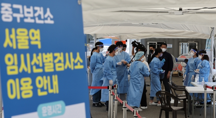 S. Korea's new COVID-19 cases hit nearly 100,000