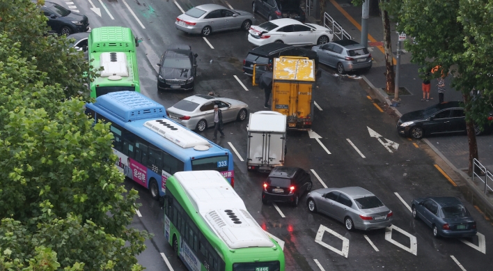 Seoul commuters battle fallout from intense rain