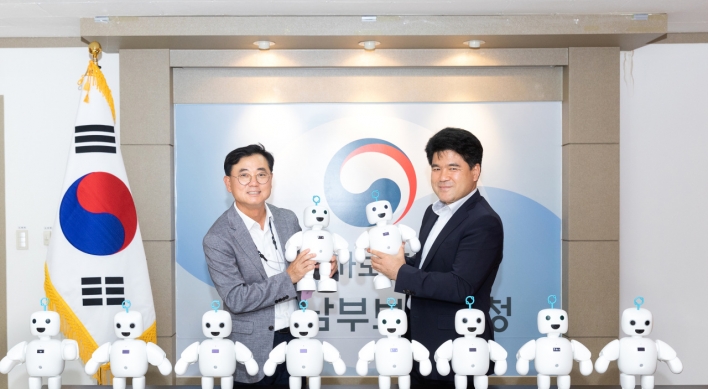 Hyosung donates AI care robots to older veterans