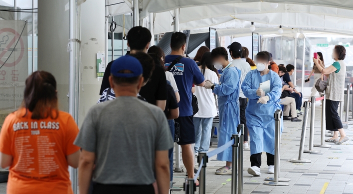 S. Korea's new COVID-19 cases fall to nearly 10,000 amid virus slowdown