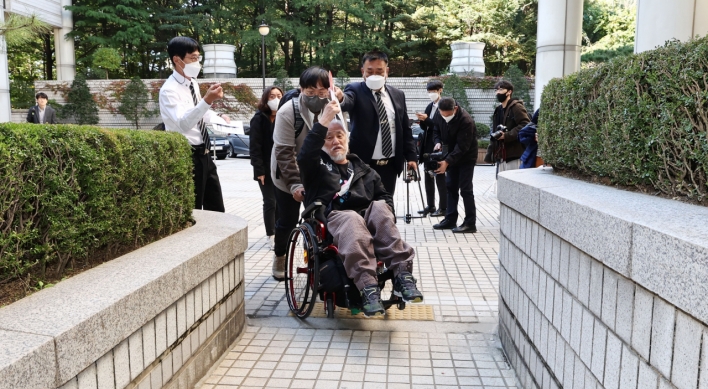 Disabled advocacy group chief gets suspended jail term for organizing protests