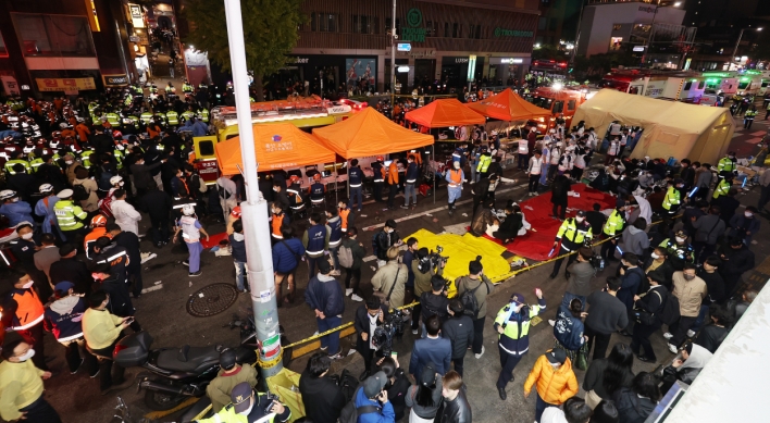 Rescue workers set up emergency medical center following Itaewon Halloween incident