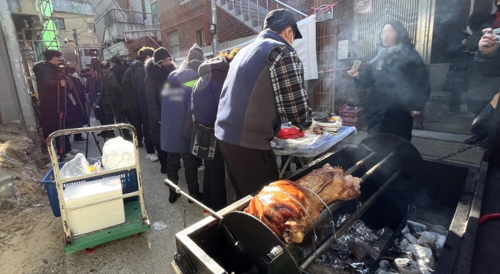 Residents of Daegu protest mosque construction with pork barbecue