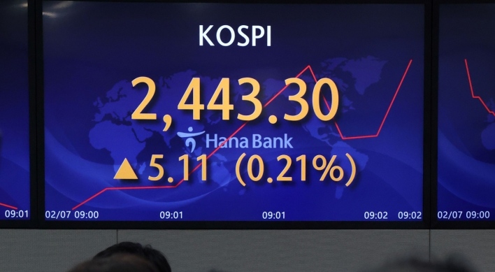 Seoul shares open higher on tech gains