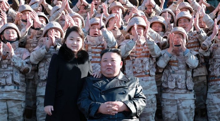 N. Korean leader visits barracks with his daughter to mark army founding anniv.