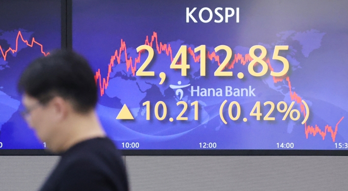 Seoul shares open higher on eased banking woes