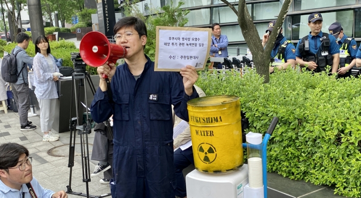 Environmental group protests Fukushima wastewater discharge plan