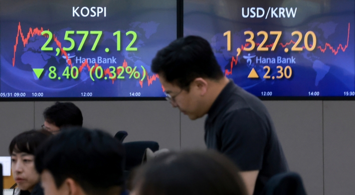 Seoul shares open lower ahead of China's rate decision