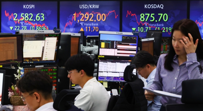 Seoul shares down for third day ahead of Powell's testimony
