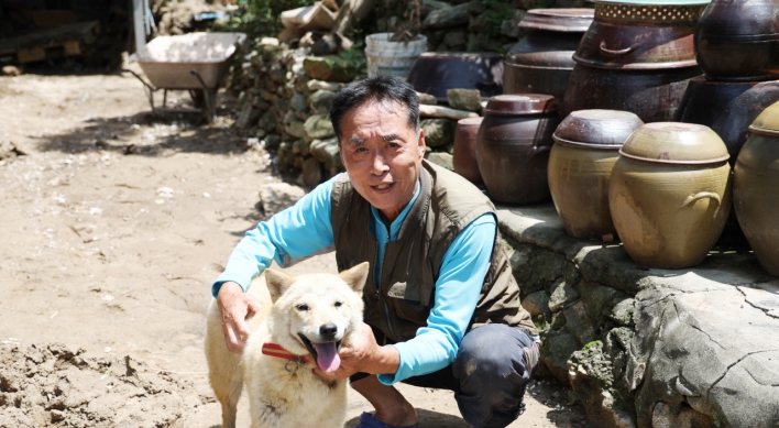 Dog makes miraculous return in village destroyed by landslide