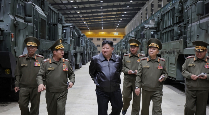 N. Korean leader inspects new tactical missile system