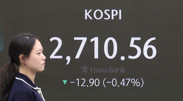 Seoul shares open lower on Fed minutes