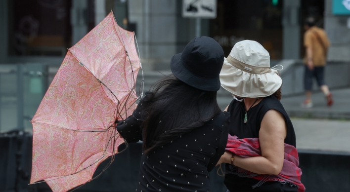 Heavy rainfall soaks Korea as summer rainy season begins