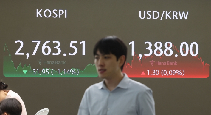 Seoul shares fall over 1 pct as chip stocks slip