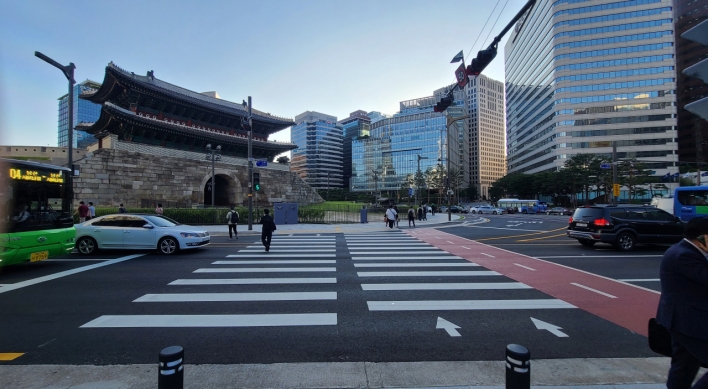 Woman stabbed to death in central Seoul, suspect caught