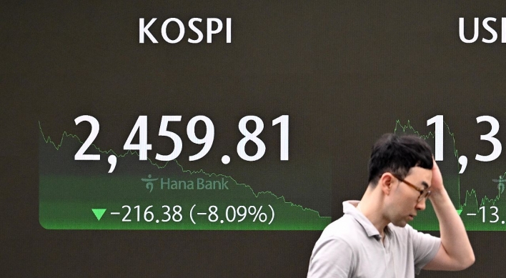 Korean shares tank as global rout continues