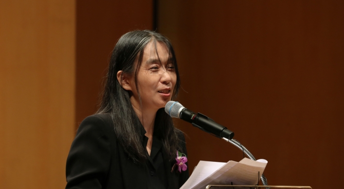 Han Kang says she wants to 'meet readers through writing' in her first public speech since Nobel Prize win