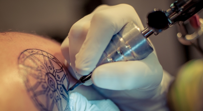 Tattoo artist calls for all body inking to be legal at audit