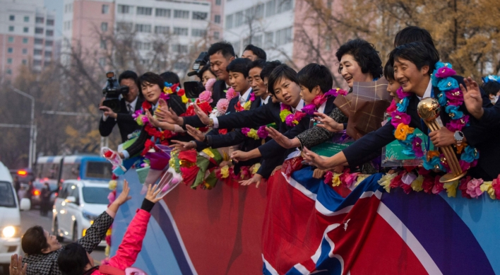 N. Korea's World Cup-winning footballers get heroes' welcome home