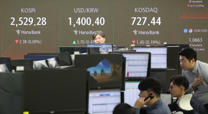 Seoul shares open lower amid continued 'Trump trade'