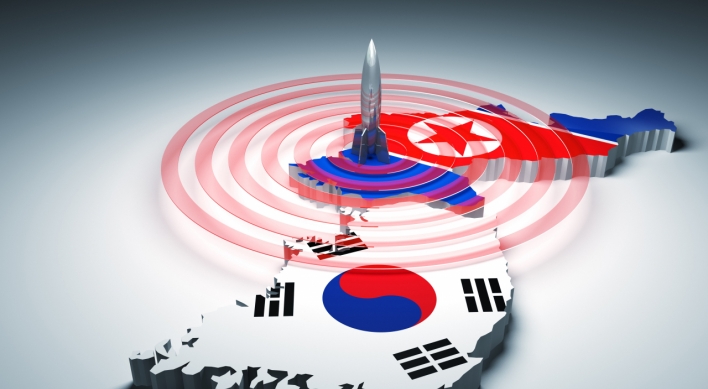 One-third in global poll see NK denuclearization as key to unification