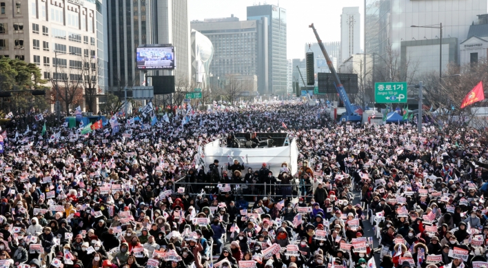 [From the Scene] Yoon supporters at Gwanghwamun call impeachment vote ‘invalid’