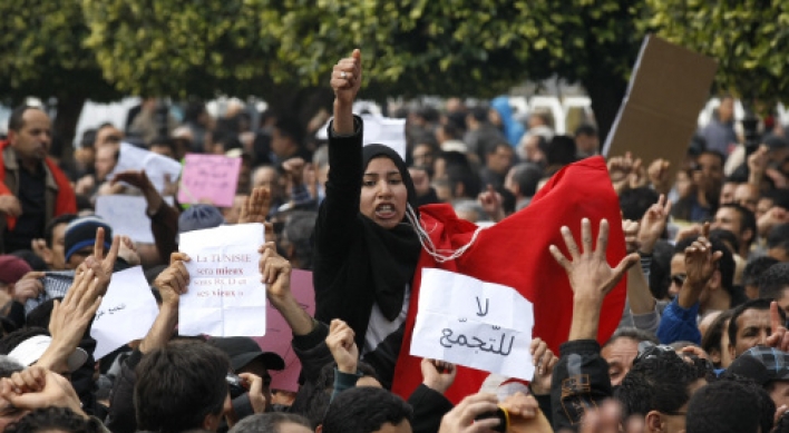Tunisian leader vows ‘break’ with old regime