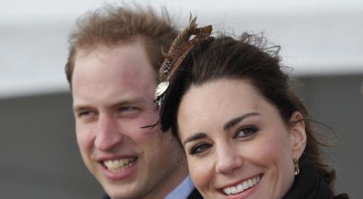 Bubbly Kate and William launch lifeboat before wedding