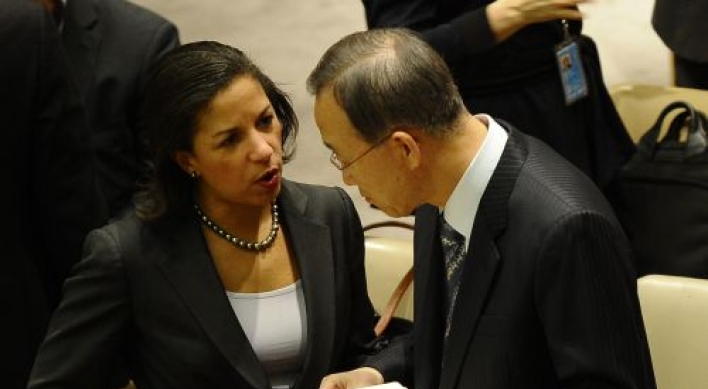 UN council slaps sanctions on Libya's Gadhafi