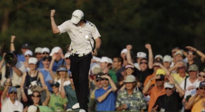 McIlroy clings to Masters lead