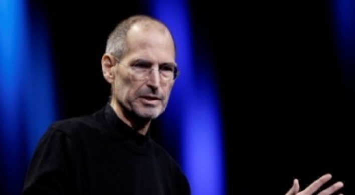 Still-frail Jobs appears to hail Apple's latest