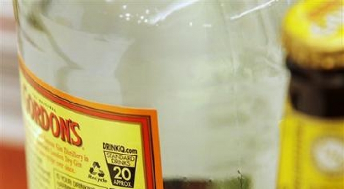 Australia puts health warnings on booze bottles