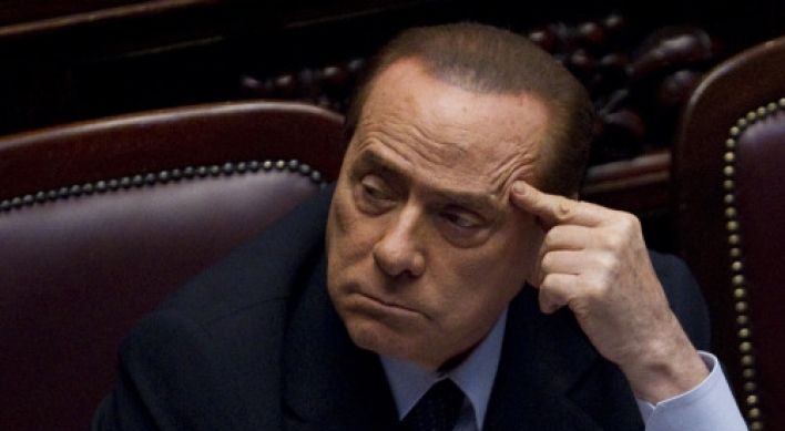 Berlusconi faces hearings on bribery, sex crime