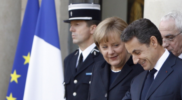 Merkel, Sarkozy want new EU treaty