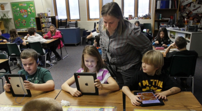 Students learn with donated iPads
