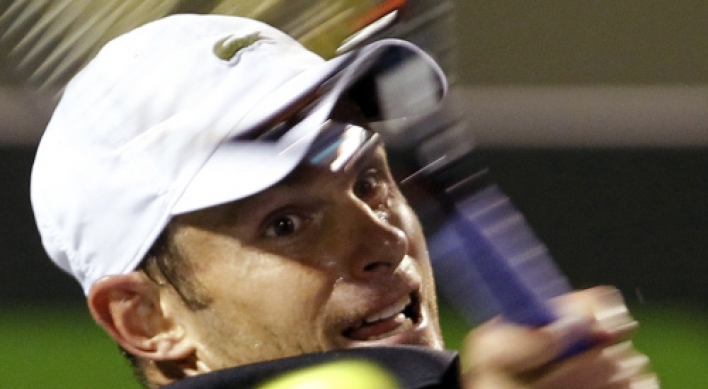 Roddick handles Federer