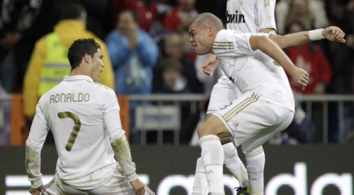 Ronaldo, Messi set Spanish goal mark