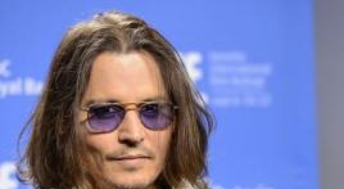 Woman claims damages over Depp guards ‘attack’