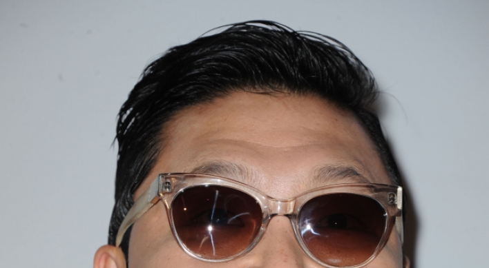 Psy apologizes for past anti-American lyrics